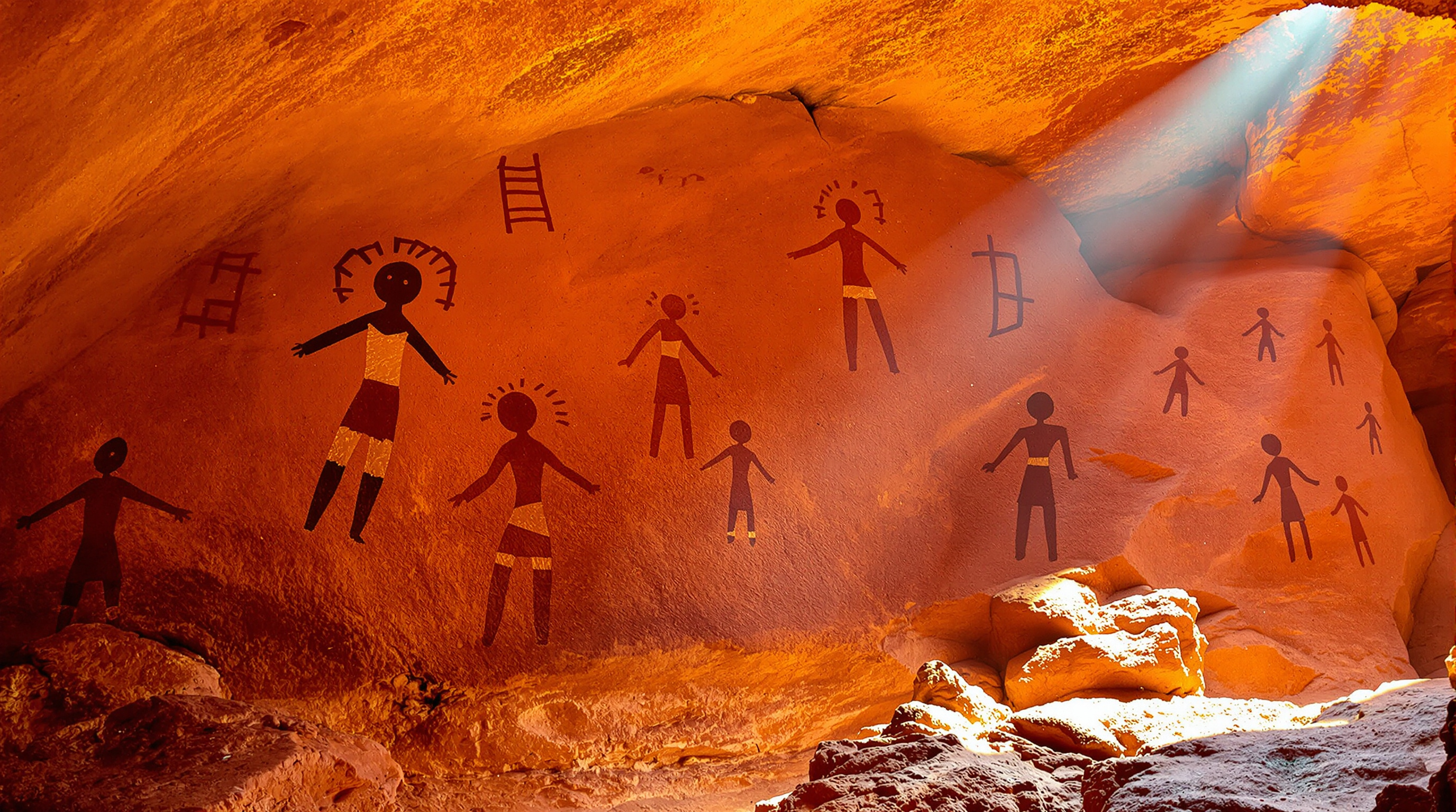 Painted rock shelter in the Americas showing prehistoric figures